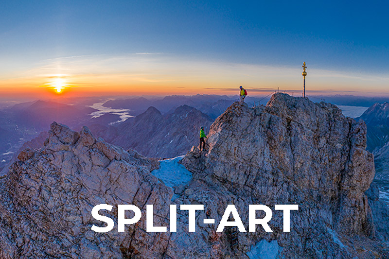 to the top - Bergsteiger am Zugspitzgipfel bei Sonnenaufgang