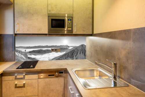 Blick über Wank ins Wettersteingebirge - Genuss - Größe ca. 150x60cm, Seitenverhältnis 2,5:1 - Bergsteiger im Estergebirge über Nebelmeer - weitere Infos unter https://www.kriner-weiermann.de