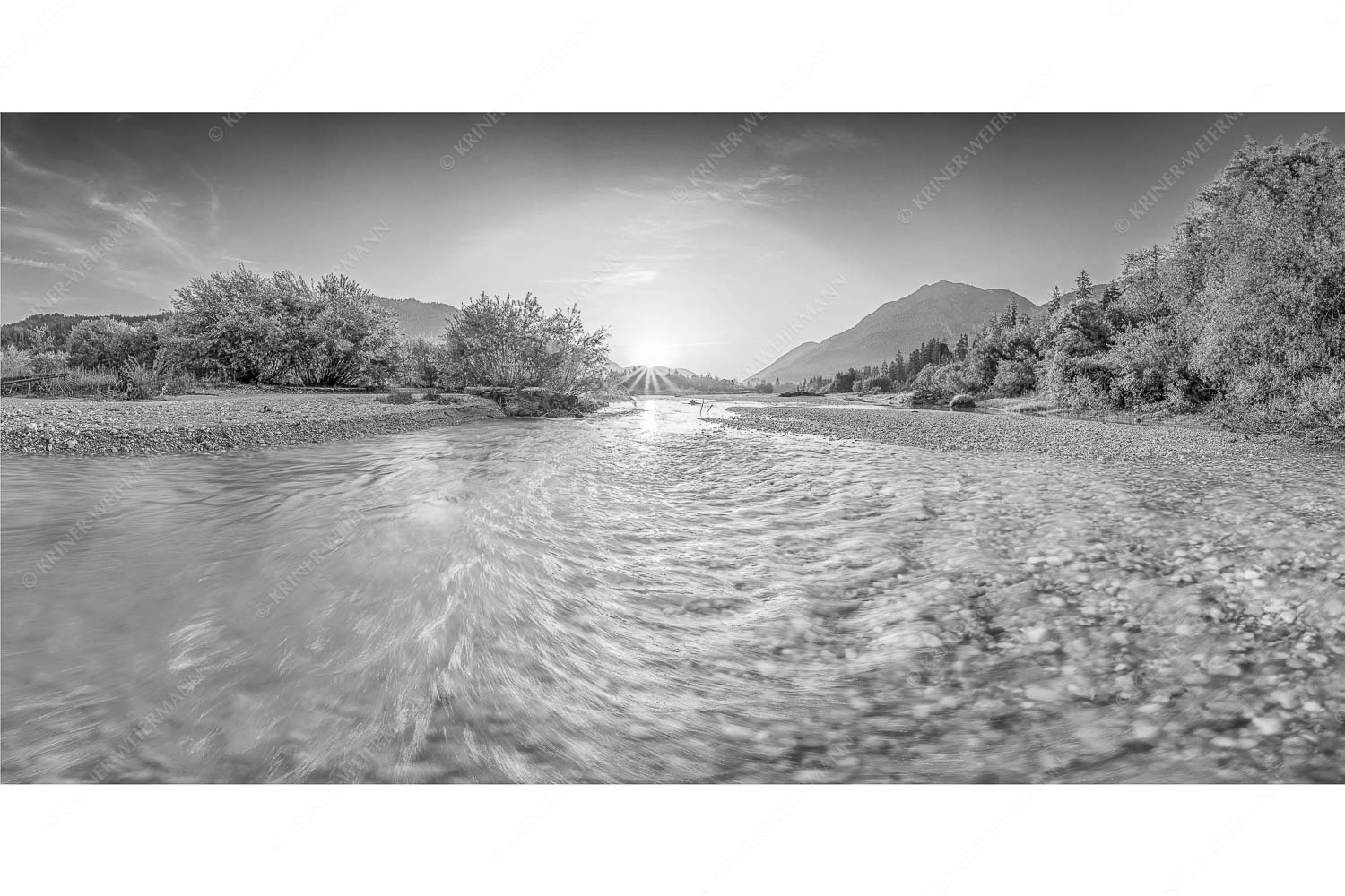 Blick über die Isar in den Sonnenaufgang