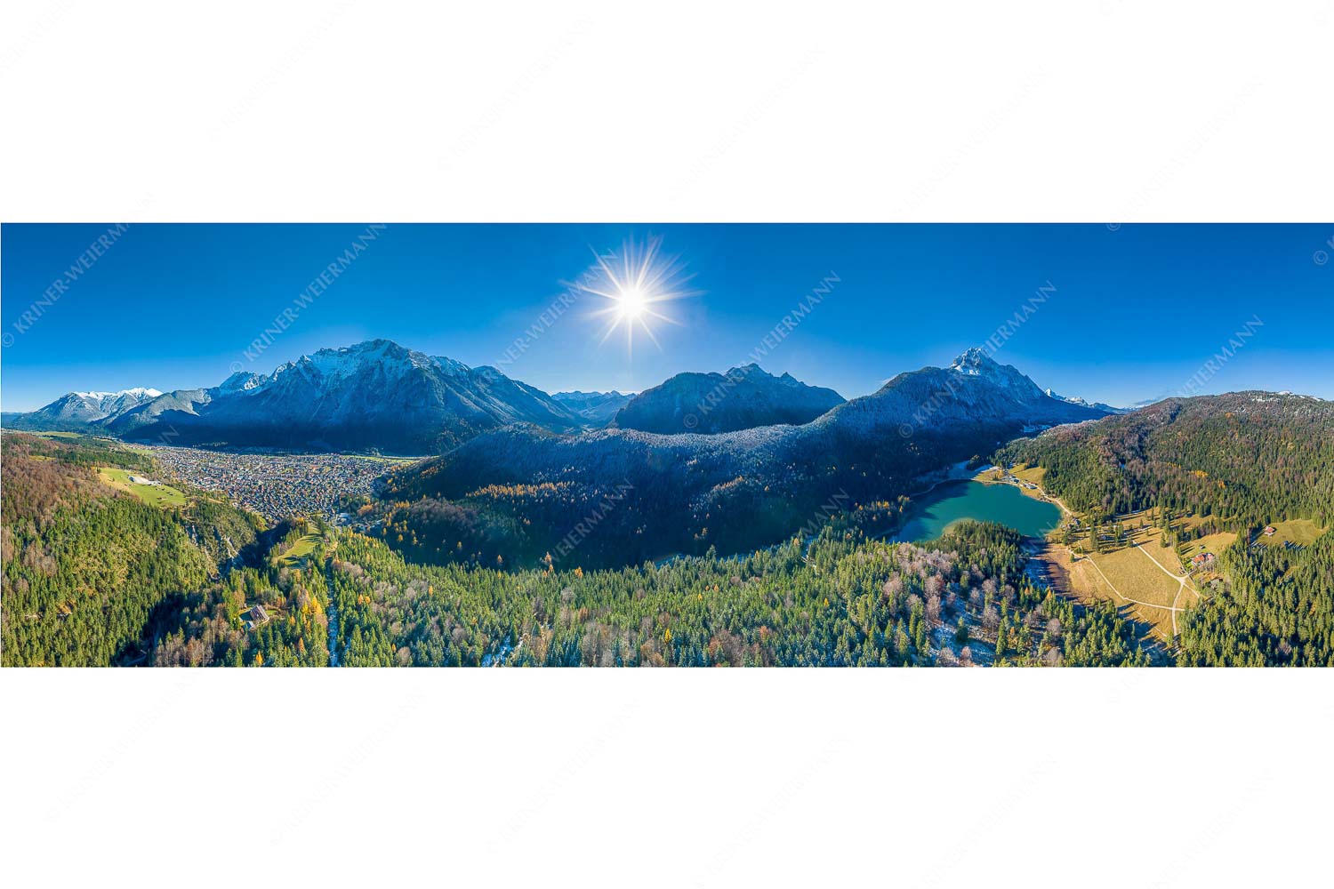 Blick auf Mittenwald am Karwendel und dem Lautersee am Wetterstein - Erstes Weiss - Seitenverhältnis 3:1 - Mittenwald und Lautersee - weitere Infos unter https://www.kriner-weiermann.de