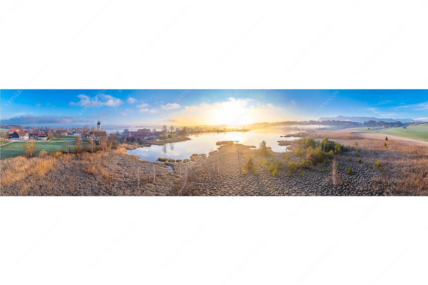 Blick über den Froschhauser See in den Sonnenaufgang